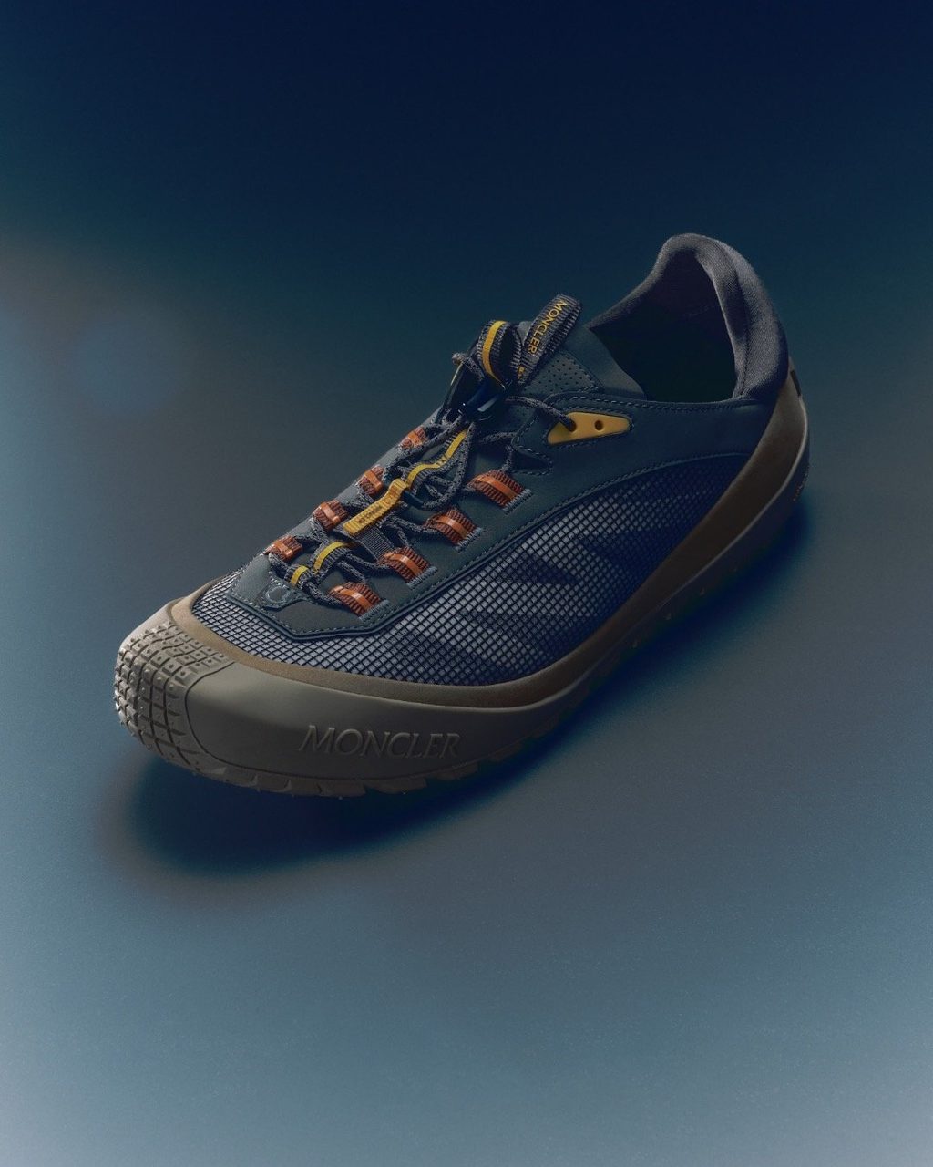 Moncler just dropped a new technical sneaker, the Trailgrip LP
