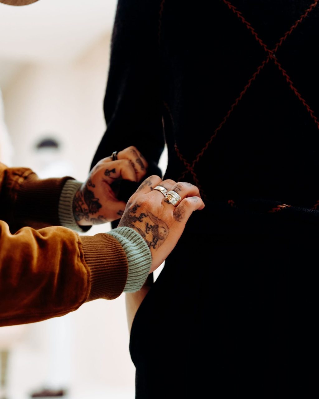 TATTOOS, TRAVEL & CREATIVITY: DR. WOO FOR LORO PIANA’S FW23 COLLECTION