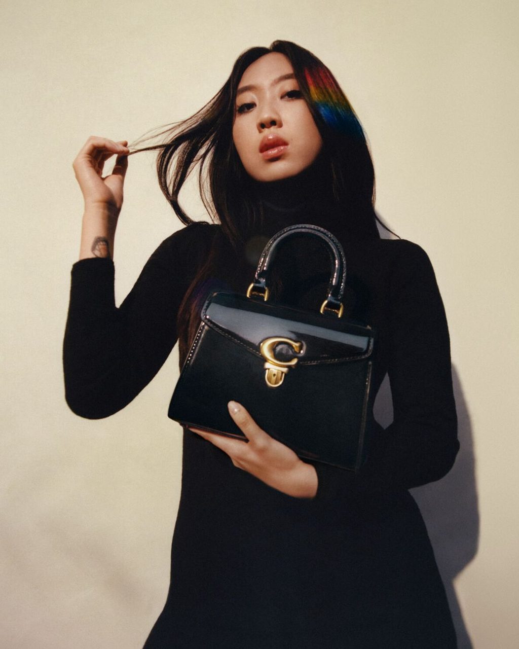Coach wants you to “Wear Your Shine” like Dove Cameron and Youngji