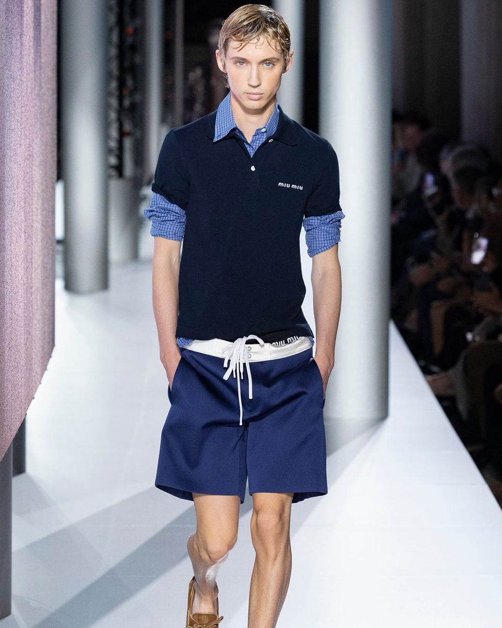 Miu Miu clocked off work and got caught in the rain for SS24