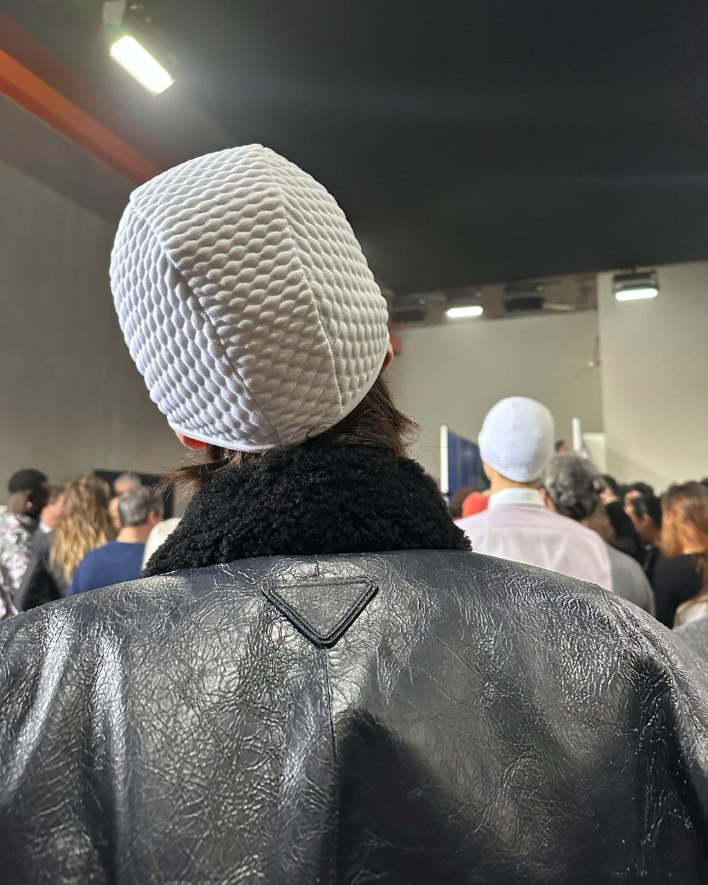 Key pieces from Prada’s Fall/Winter 2024 collection: swim caps, smart ties & more