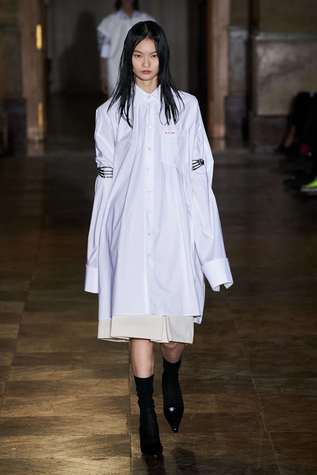 RAF SIMONS SS22: "UNIFORM ON A BOY, AND MORE COUTURE ON A GIRL"