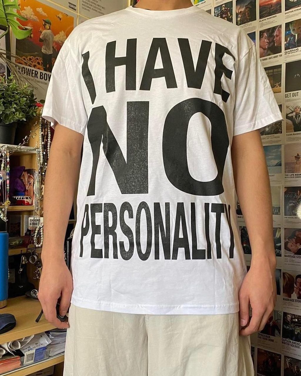 Feminism is a slogan baby tee