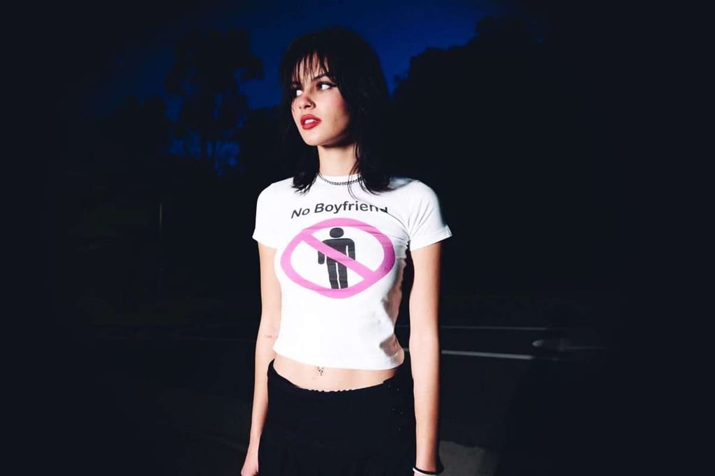 Feminism is a slogan baby tee