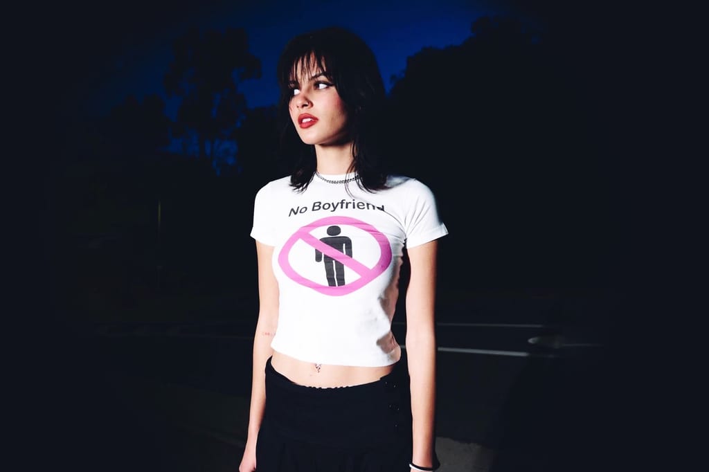 Feminism is a slogan baby tee